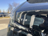 The 2025 Cadillac XT4 Sport featured in Stellar Black Metallic with a Jet Black is the embodiment of... (image 6)
