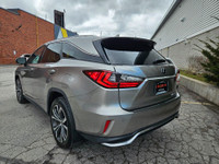Indulge in the perfect fusion of sophistication, power, and efficiency with the 2018 Lexus RX 450hL.... (image 4)