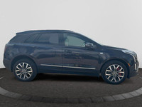 This 2025 Cadillac XT5 in Midnight Sky Metallic is equipped with AWD and Gas V6 3.6L/ engine. The Ca... (image 5)
