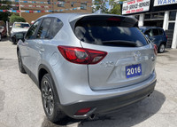 ...WE INCLUDE EVERYTHING.…CX-5 GT AWD NAVI BT REV CAM SUNROOF HEAT LEATHER.…PERFECT ........PRICE IN... (image 6)