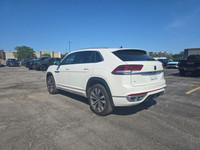 Command the road in this sleek 2023 Volkswagen Atlas Cross Sport Execline. This pristine Oryx White... (image 3)