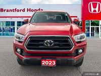 Conquer any terrain with this 2023 Toyota Tacoma Crew Cab Pickup. Its robust four-wheel-drive system... (image 8)