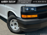 Explore the 2025 Chevrolet Express Cargo Van, in classic white, with an efficient rear-wheel-drive s... (image 1)