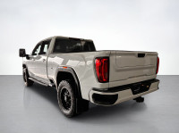 Drive our used Diesel powered 2021 GMC Sierra 2500 AT4 Crew Cab standard box 4X4 in Summit White and... (image 2)