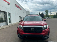 Our 2023 Honda Ridgeline Touring in Radiant Red Metallic is a local lease return! Call to book an ap... (image 8)
