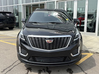 The 2024 Cadillac XT5 Luxury in Stellar Black Metallic combines refined styling with practical perfo... (image 1)