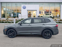 This Volkswagen Tiguan boasts a Intercooled Turbo Regular Unleaded I-4 2.0 L/121 engine powering thi... (image 1)