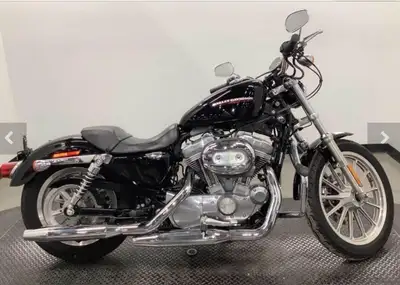 Welcome New Riders! Financing Options Available! This XL883L only has 8,473 miles or 13,636 kms. ALL...