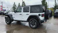 This 2025 JEEP WRANGLER 4-DOOR RUBICON has the following options Cloth Low-Back Bucket Seats, Remote... (image 1)