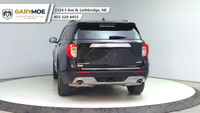 The 2024 Ford Explorer Limited 4WD in sleek black is a robust yet stylish SUV designed to conquer bo... (image 3)