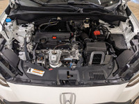 No Accidents, Service Records Available! HPD Kit The 2023 Honda HR-V EX-L Navi AWD in a pristine whi... (image 7)