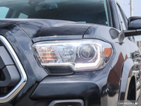 From work to weekends, this previous daily rental Black 2023 Toyota Tacoma muscles through any terra... (image 5)