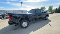 This Ram 3500 is equipped with: Leather-Faced Front Vented 40/20/40 Bench, Power Sunroof, Remote Sta... (image 2)