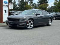 This 2018 Dodge Charger SXT has a Grey Exterior and Cream Interior with seating for 5. Equipped with... (image 1)
