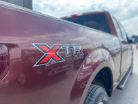 Hop into the bold and burly 2016 Ford F-150 XLT 5.0L, a pickup that's as ready for adventure as it i... (image 7)