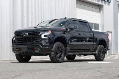 Tackle any terrain with confidence in the 2025 Chevrolet Silverado 1500 LT Trail Boss. Powered by th...
