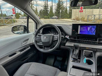 This Toyota Sienna delivers a Gas/Electric I-4 2.5 L/152 engine powering this Variable transmission.... (image 8)