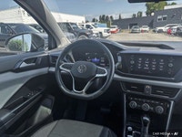 This Volkswagen Taos boasts a Intercooled Turbo Regular Unleaded I-4 1.5 L/91 engine powering this A... (image 8)