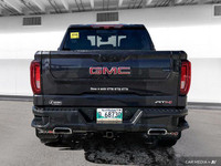 The 2022 GMC Sierra includes leather seats, heated and cooled front seats, and a heated steering whe... (image 4)