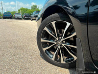 This 2017 Toyota Corolla SE boasts a sleek Slate Metallic exterior and a comfortable BLACK SOFTEX LE... (image 9)