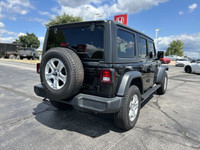 Conquer any terrain with this 2018 Jeep Wrangler Unlimited Sport, a black beauty boasting a powerful... (image 4)