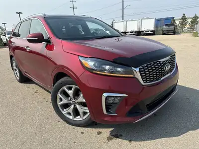 This 2019 Kia Sorento is finished in striking Passion Red Metallic with a refined Black interior, of...