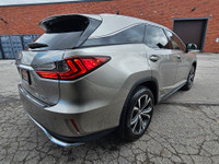 Indulge in the perfect fusion of sophistication, power, and efficiency with the 2018 Lexus RX 450hL.... (image 6)