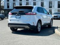 This 2023 Ford Edge has an Oxford White Exterior and Ebony Activex Interior with seating for 5. Equi... (image 6)