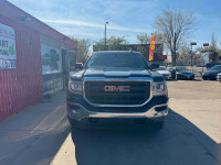 The 2018 GMC Sierra 1500 LT Crew Cab in black is a full-size pickup that combines rugged capability... (image 2)
