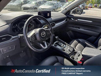 This 2025 Mazda CX-5 boasts a pristine white exterior and is ready for its next adventure, a fresh t... (image 9)