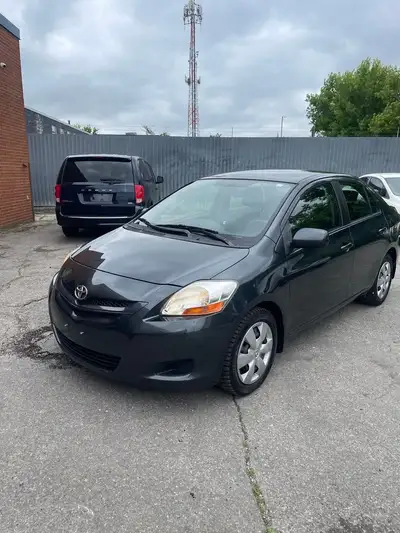 very clean well maintained 4dr toyota yaris sedan power windows and locks, cold ac auto transmission...