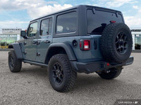 This Jeep Wrangler boasts a Intercooled Turbo Premium Unleaded I-4 2.0 L/122 engine powering this Ma... (image 2)