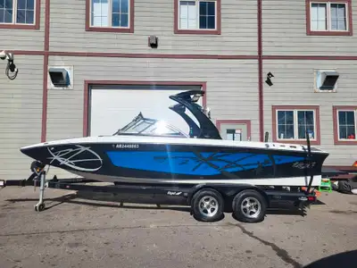 2010 TIGE RZ2 5.7L PCM 343 600 HOURS FEATURES: - Wakeboard Tower w/ Speakers, Swivel Board Racks & B...