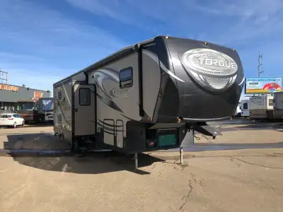 10' Garage, Heated Under Belly, an Onan 5500 Generator, Sleeps 8 with 2 Bathrooms! Call Dealership f...