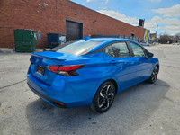 Buckle up, because this 2023 Nissan Versa SR CVT in Electric Blue Metallic isnt just a carits your t... (image 6)