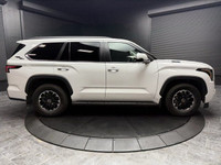 The elegance of White paired with a stately Black interior, the 2024 Toyota Sequoia TRD Off-Road awa... (image 1)