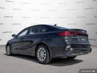 This 2023 Kia Forte LX boasts a sleek black exterior and a surprisingly spacious interior perfect fo... (image 3)