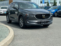 This 2021 Mazda CX-5 Signature has a Grey Exterior and Brown Interior with seating for 5. Equipped w... (image 9)