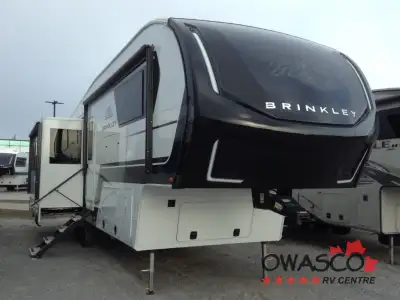 Call for Special Pricing! Brinkley Model Z fifth wheel 3100 highlights: Theater Seating Fireplace In...