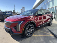 Finished in a head-turning Radiant Red Tricoat with a sleek Noir interior, the 2025 Cadillac Optiq E... (image 3)