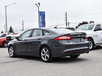The 2015 Ford Fusion is a sleek, midsize sedan that offers a perfect blend of style, efficiency, and... (image 5)