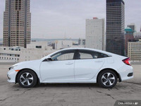 Wheel Covers,Intermittent Wipers,Brake Assist,Daytime Running Lights,Rear Defrost,4-Wheel Disc Brake... (image 2)
