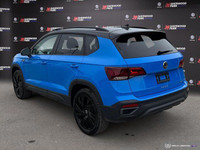 The 2024 Volkswagen Taos Comfortline Black Edition AWD blends turbocharged performance with bold bla... (image 3)