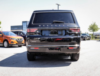 Experience the perfect blend of luxury, capability, and style with the sophisticated Black Jeep Wago... (image 3)