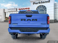 Experience the power and luxury of this 2025 Ram 1500 Laramie Night Edition Crew Cab 4x4. Boasting a... (image 3)