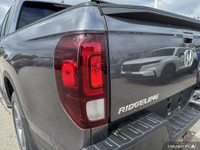 The 2021 Honda Ridgeline Touring offers a premium blend of comfort, technology, and utility. Equippe... (image 8)