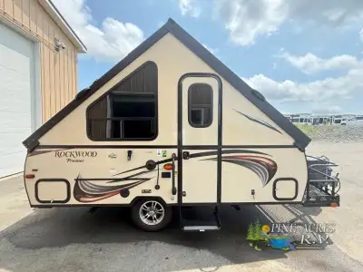 The 2015 Forest River Rockwood A122BH is a hard-sided folding camper with a sleeping capacity for up...