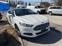 LOW MILEAGE FOR AGE!! TITANIUM MODEL!! LEATHER INTERIOR, ALL WHEEL DRIVE, BACKUP CAMERA, BLUETOOTH,... (image 1)