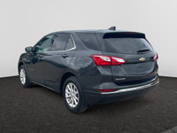 Offering excellent driving manners, this Chevrolet Equinox is Nightfall Grey Metallic in color and i... (image 2)