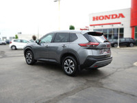 Experience the 2022 Nissan Rogue SV, a versatile SUV perfect for navigating city streets and weekend... (image 6)